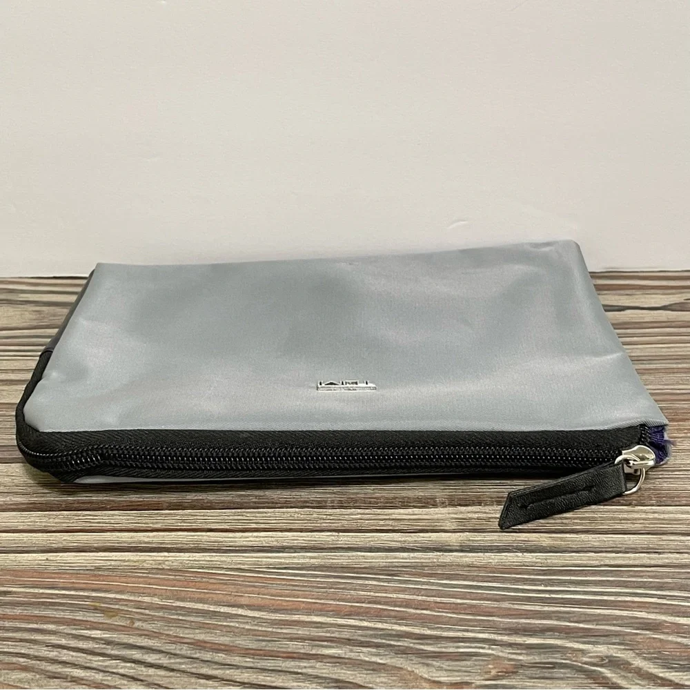 TUMI for DELTA Cosmetic Bag Travel Vacation Toiletry Grey Nylon Zip Close Lined